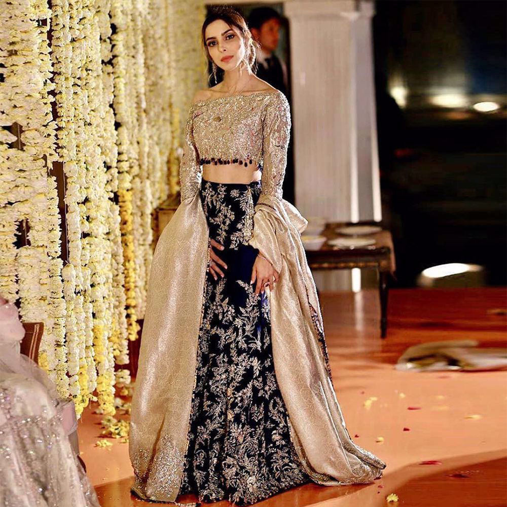 Picture of Our client making a statement wearing an exquisite lehnga choli from our collection.