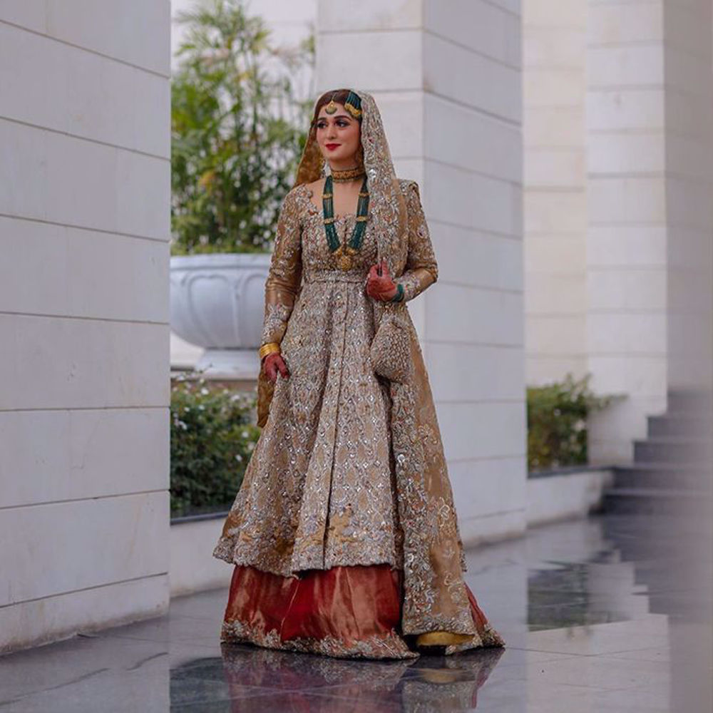 Picture of Curated with ravishing hues & meticulous details, Khadija dons one of our Timeless Classics, giving her the imperial look on her big day with a regal aura