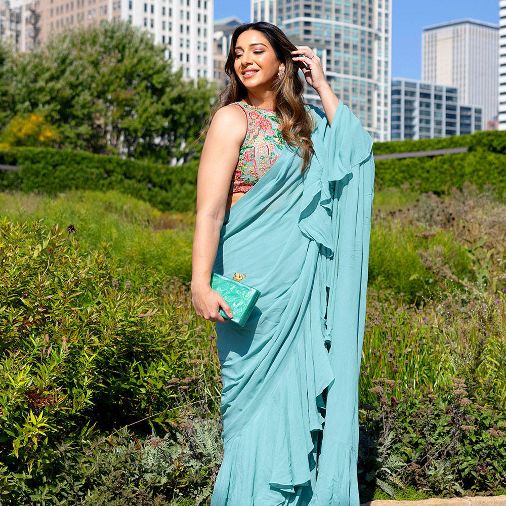 Picture of Browngirlsstyles Witness the enchanting beauty of our ice blue ruffle saree
