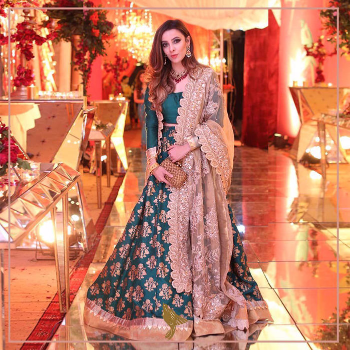 Picture of A hand-printed lehnga paired with a choli and a pristine zardozi dupatta.