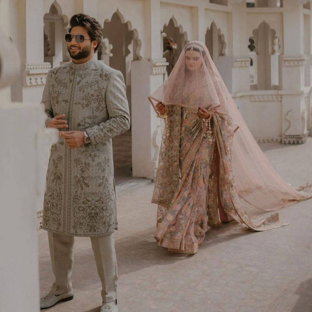 Picture of Anmol Mehmood exudes regal grace in our exquisitely hand-crafted wedding ensemble