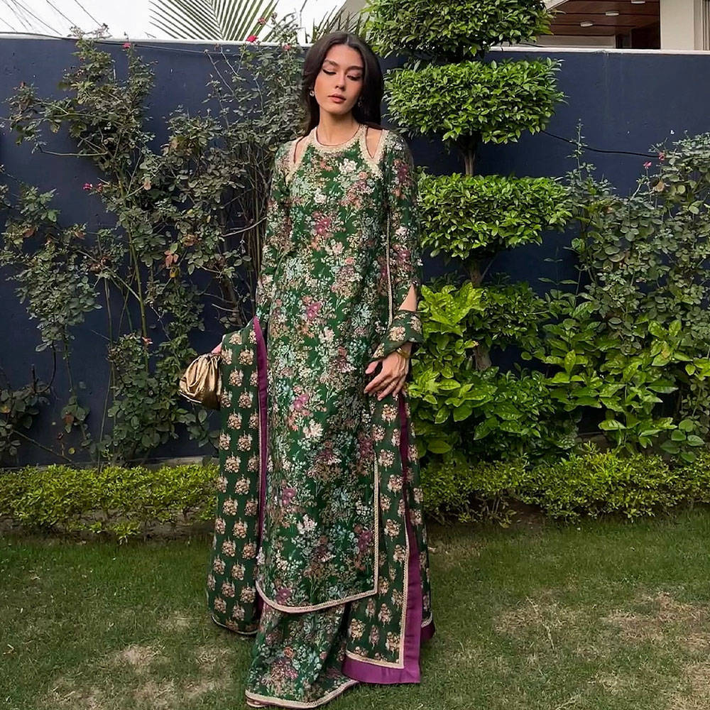 Picture of Abeera Aziz graces our collection in this eye-catching leaf green ensemble